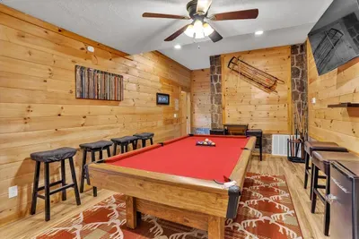 Pool table on the lower level for late-night fun 🎱