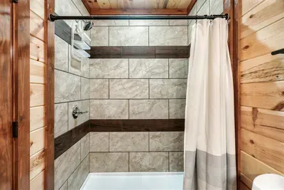 Full tub and tile shower combo — rinse off the trail dust, fill the tub, take your time. Clean, spacious, and well-appointed for a full house.