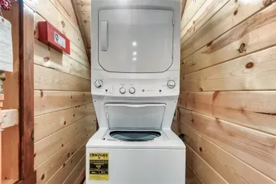 In-unit stacked washer and dryer — pack lighter, stay longer. For multi-night stays and big groups, this is the amenity that quietly makes every other amenity better.