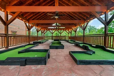Nine holes of private mini golf under a handcrafted timber roof — challenge accepted. Rain or shine, the competition doesn't stop at this cabin.