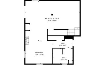 Lower level: a large recreation room, a bedroom, and a full bath. The game floor that keeps everyone entertained without crowding the main living space.