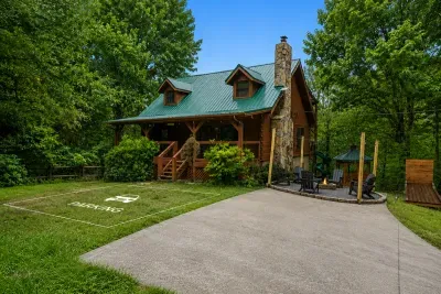 Level paved parking right at the door with room for the whole caravan. No gravel switchbacks, no white-knuckle climb. Pull in and start the vacation.