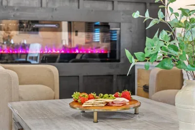 Unwind by the fire — perfect for evenings spent with good food and great company.