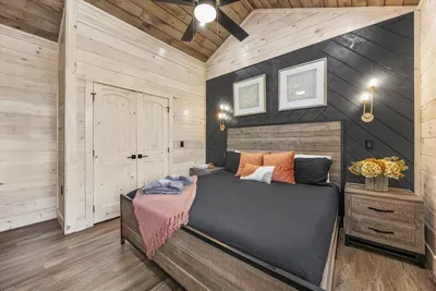 Bright, open space with a king bed and rustic-modern finishes for a restful night.