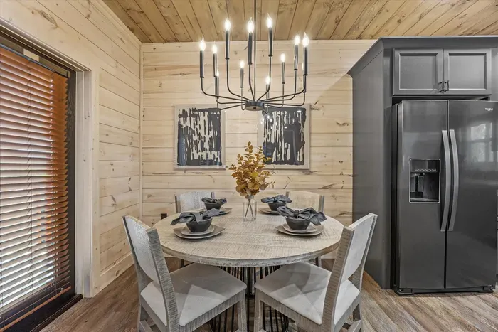This dining area is perfectly situated next to the kitchen for easy meal service.