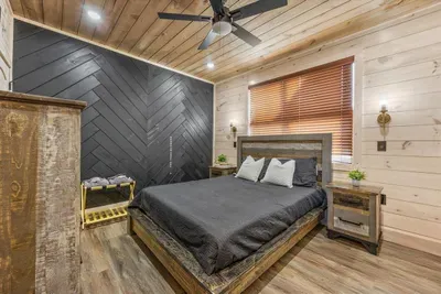 Get a great night's rest in this private retreat, featuring a cozy king bed and plenty of closet space.