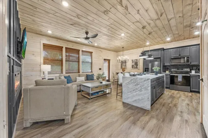 This newly renovated living space combines modern comfort with rustic cabin charm.