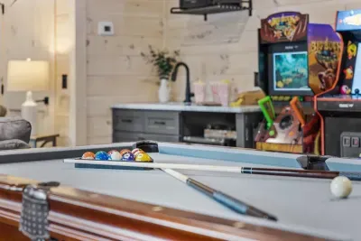 Rack 'em up! Our pool table is ready for a game.