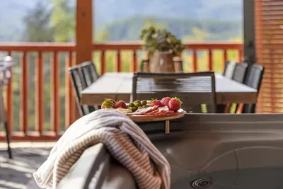 This private deck is an extension of the cabin's living space, offering a peaceful outdoor retreat.