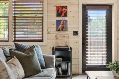 A thoughtful touch — spin records, sip your favorite drink, and enjoy cabin life.