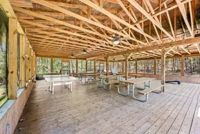 Community pavilion with picnic tables to spend meal times with friends and family.