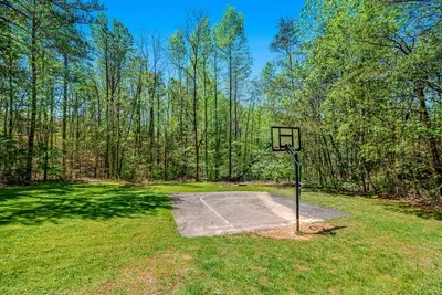 Play a game of basketball on the community basketball court.