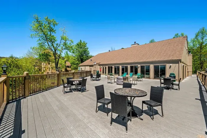 The sky deck off of the community building includes tables and chairs to take in the amazing mountain views.