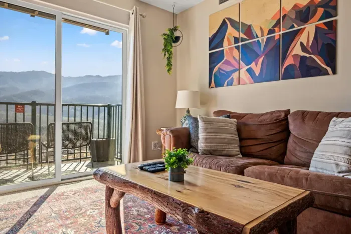 Living room includes full sofa sleeper, cable TV, and a view!