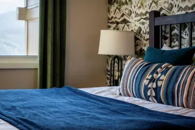 Master bedroom includes a queen bed and cable TV.