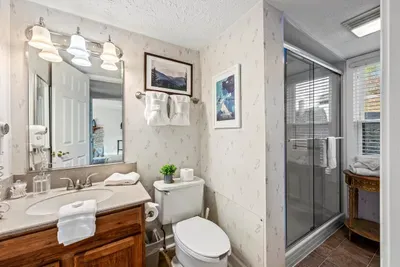 Full bathroom with walk in shower.