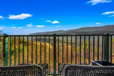 Take in the mountain view from the balcony.