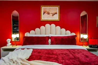 Deep red hues, soft comfort, and calming energy, a unique space designed for rest and style.