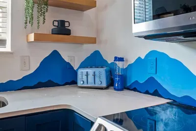 Simple kitchen essentials, a neat countertop featuring a toaster for everyday comfort.