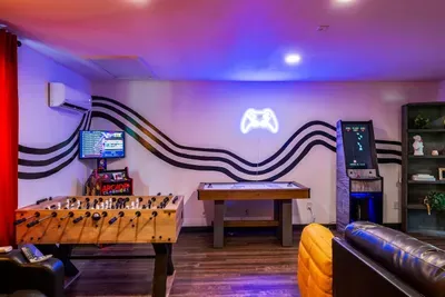 Game on, lights off, A perfect room for competition, laughter, and movie marathons.