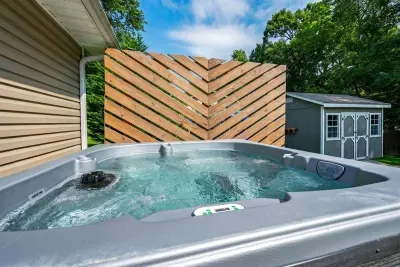 Relax and unwind in a soothing hot tub, the perfect way to end the day.