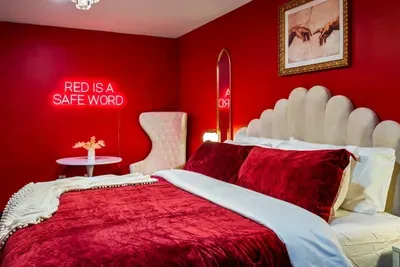 A striking red bedroom ❤️✨ warm, bold, and full of character.