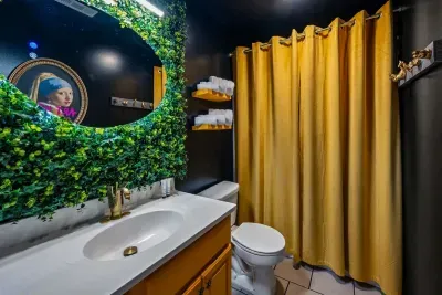 A modern bathroom with a large mirror and sleek sink clean, bright, and refreshing.