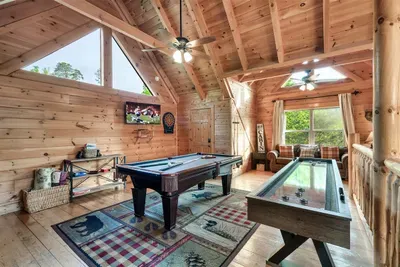 Pool table, shuffleboard, darts & TV — something fun for everyone, from kids to grandparents.