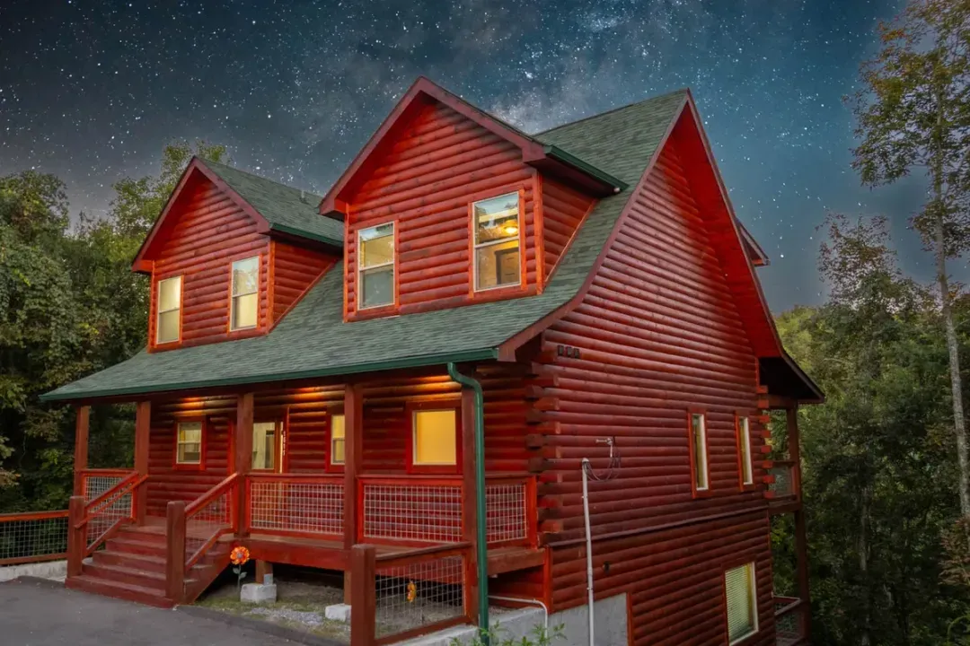 Welcome to Bearfoot Haven—a spacious Smoky Mountain cabin where family and friends can settle in under one roof.