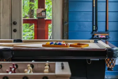Pool, foosball, and arcade games all in one room, so everyone can find their favorite way to play.