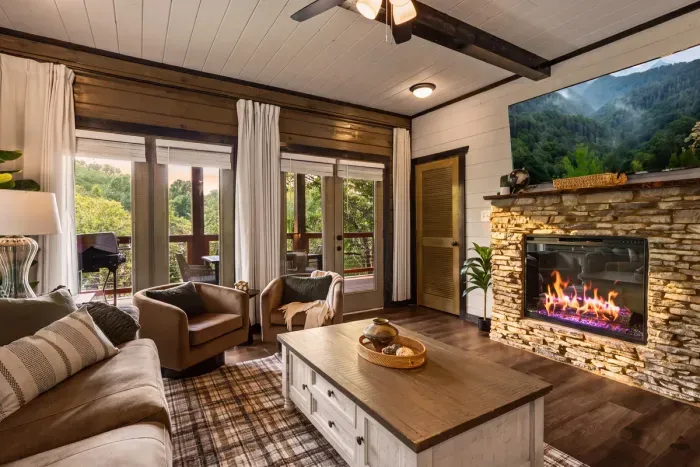 Settle in around the fireplace for movie nights, conversation, or a quiet evening back at the cabin.