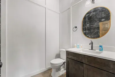 Full bathroom near the pool makes swim time simpler for a house full of family and friends.