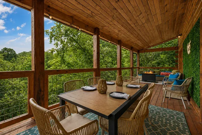 The main balcony combines covered dining and lounge areas, giving everyone more room to enjoy the outdoors.