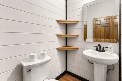Half bath near the game room keeps downstairs hangout time easy and convenient.