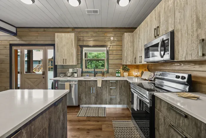 Full-size appliances, generous counter space, and an open layout make group meals easier.