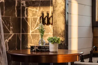 A closer look at the primary bath, with warm finishes and a soaking tub made for unwinding.