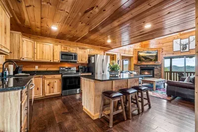 Cook, dine, and stay connected—open kitchen with a view of the living room 🏡✨