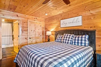 Your personal cabin haven—TV, sofa, and ensuite convenience