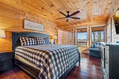 Cozy, stylish, and all yours—bedroom with TV and private bath