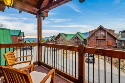 Upper level front balcony with 2 seats.  Spectacular sunsets!