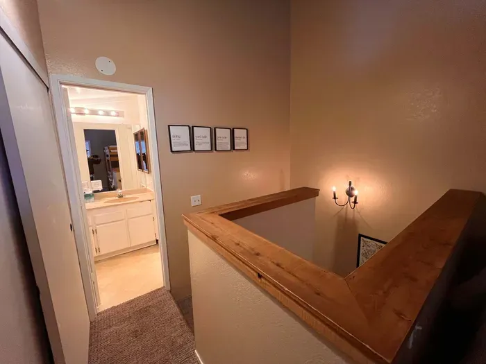 Loft Full Bathroom and Stairs to Living Room