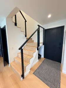 Front Entrance and Stairs to Bedroom and Loft viewed from the Kitchen