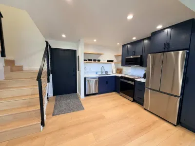 Front Entrance, Stairs to Bedroon and Loft and Kitchen
