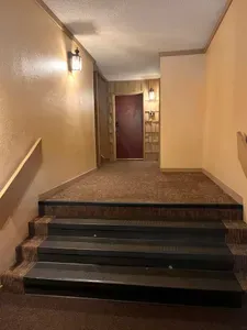 Staircase to Front Door of Condo