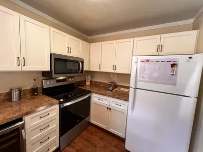Fully stocked kitchen with upgraded appliances.