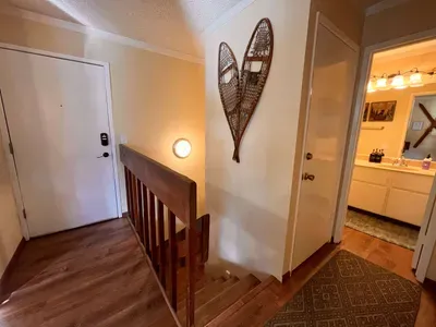 Front door, Upstairs bathroom and Stairs to Downstairs Bedrooms and Bathroom