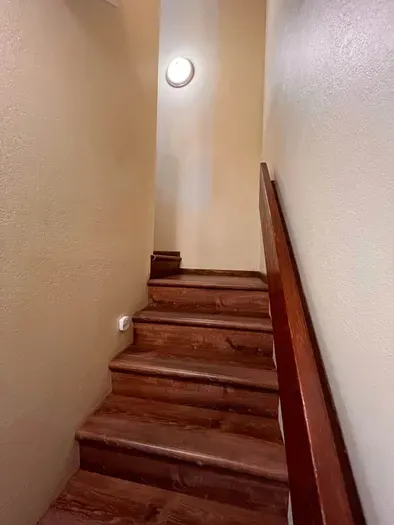 Stairs to Upstairs Kitchen and Living Room
