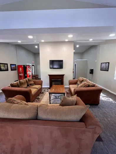 Rec Room with Couches TV, Pool Table and Soda vending machine.  This is a sharred rec room availabe to all guests in the complex.  Open from 10am to 10pm