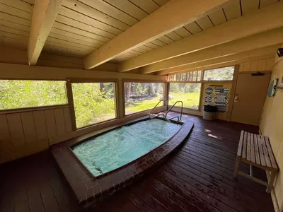 Hot Tub located on upper road of complex.  This is a sharred hot tub available to all guests in the complex.  Open from 10am to 10pm.