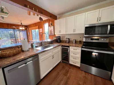 Fully stocked kitchen with upgraded appliances.